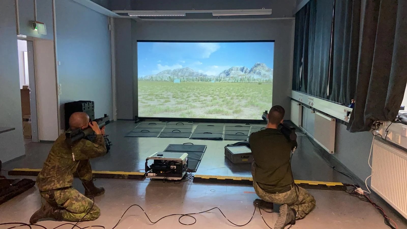 Soldiers shooting with SAS-simulator